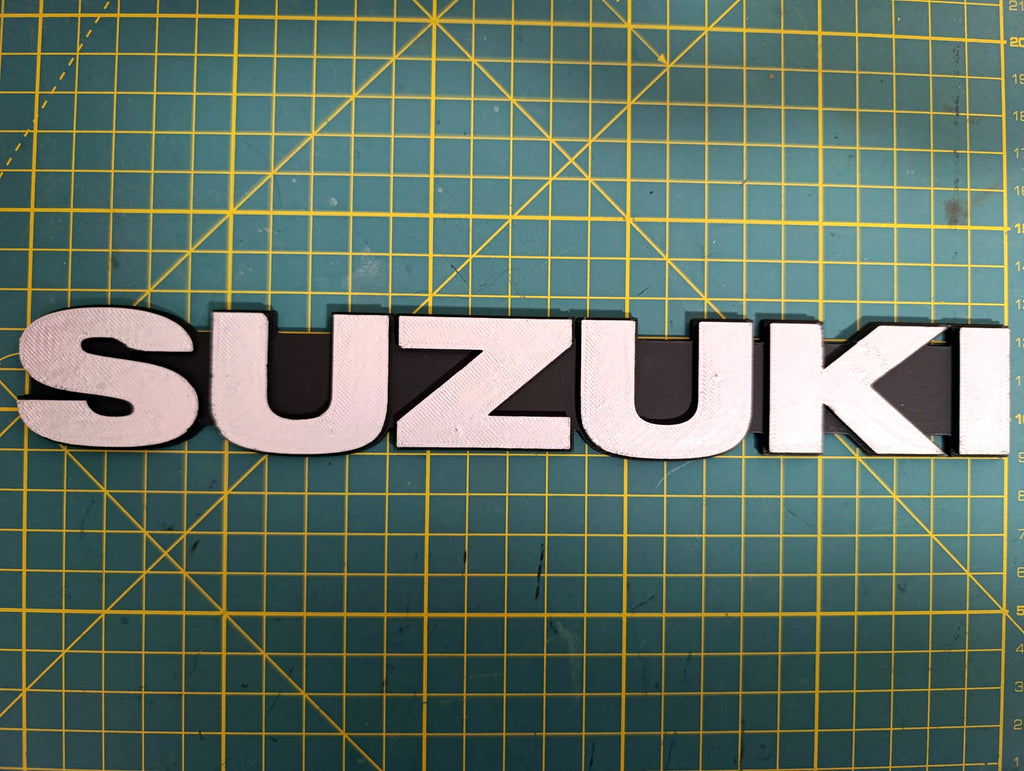 Emblema Suzuki